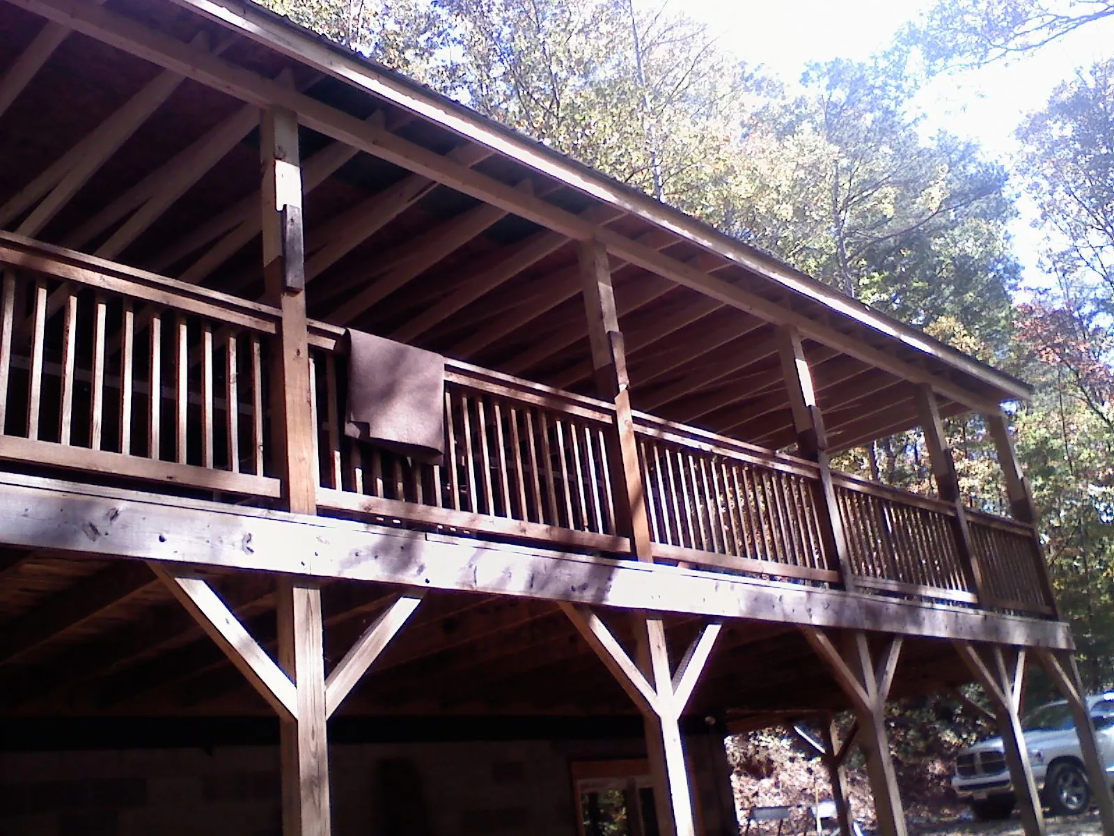 Timber framing under a new elevated porch and deck — Roof Leak Repair in Round Lake by Roofing Brothers